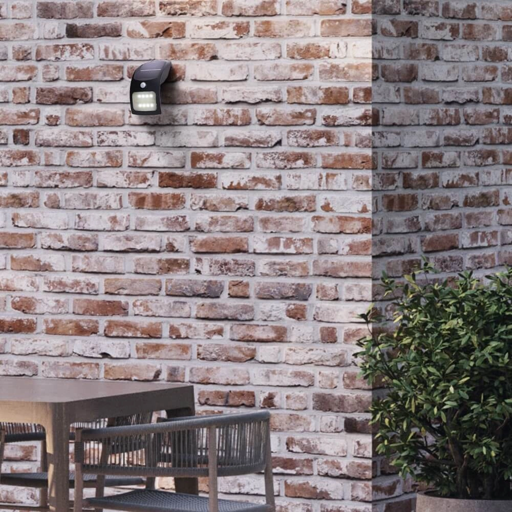 Zwarte wandlamp Solar design Searchlight 5053423241449