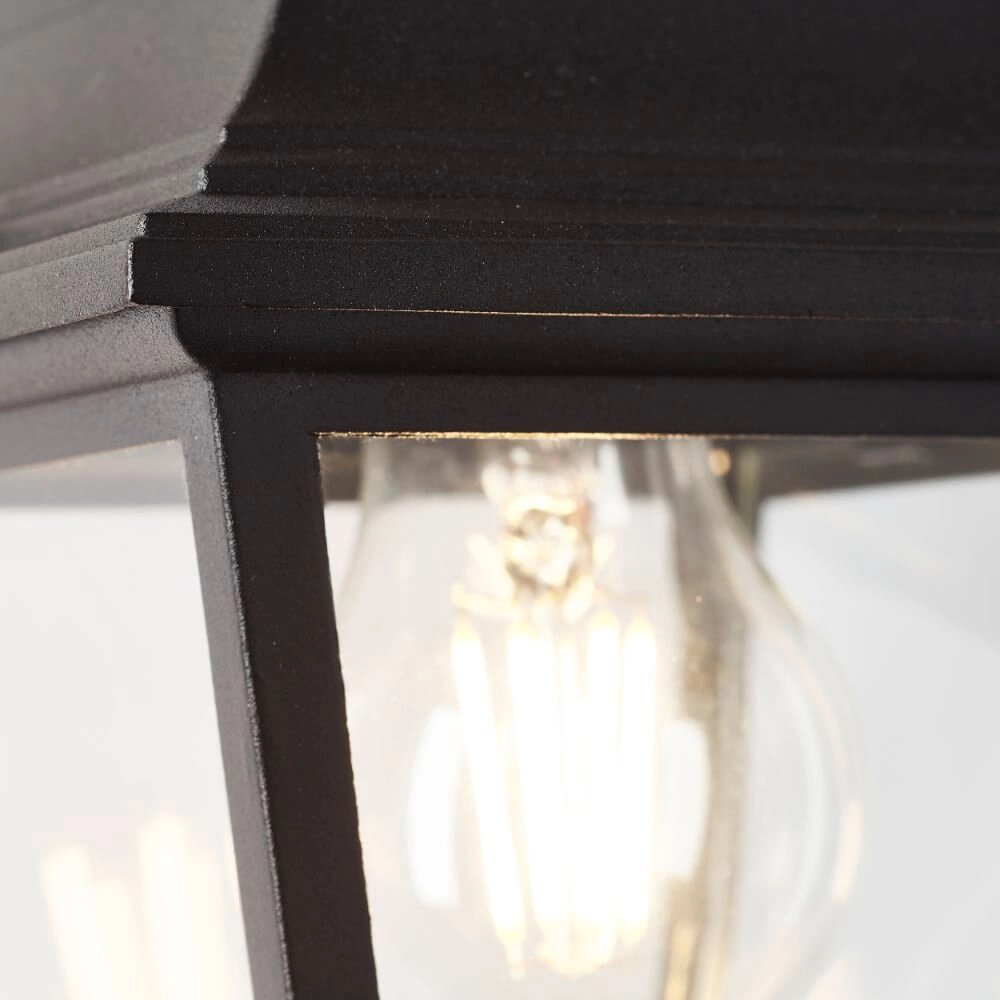 Zwarte wandlamp Nissie down Brilliant 4004353356520