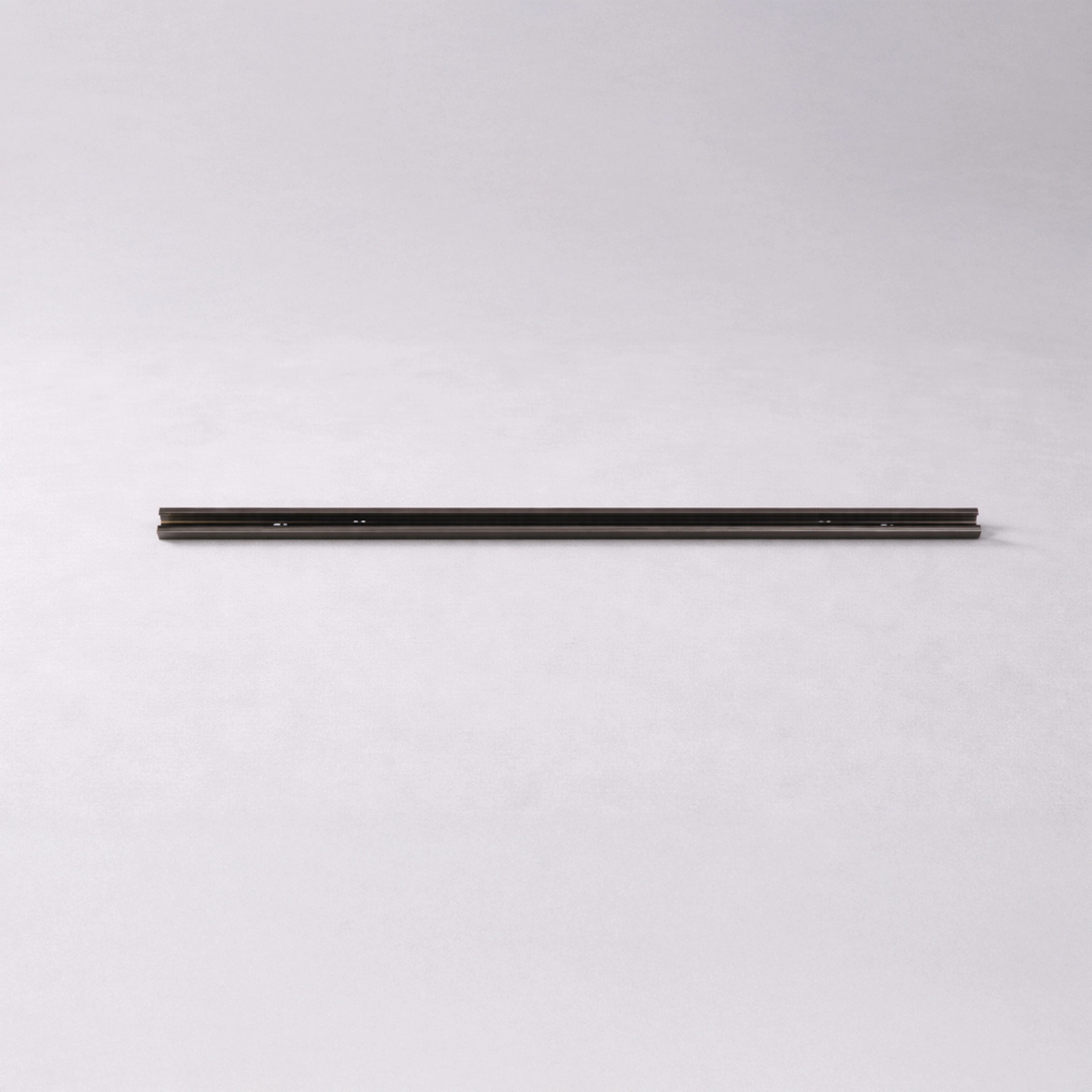 1 meter rail TraQ brons