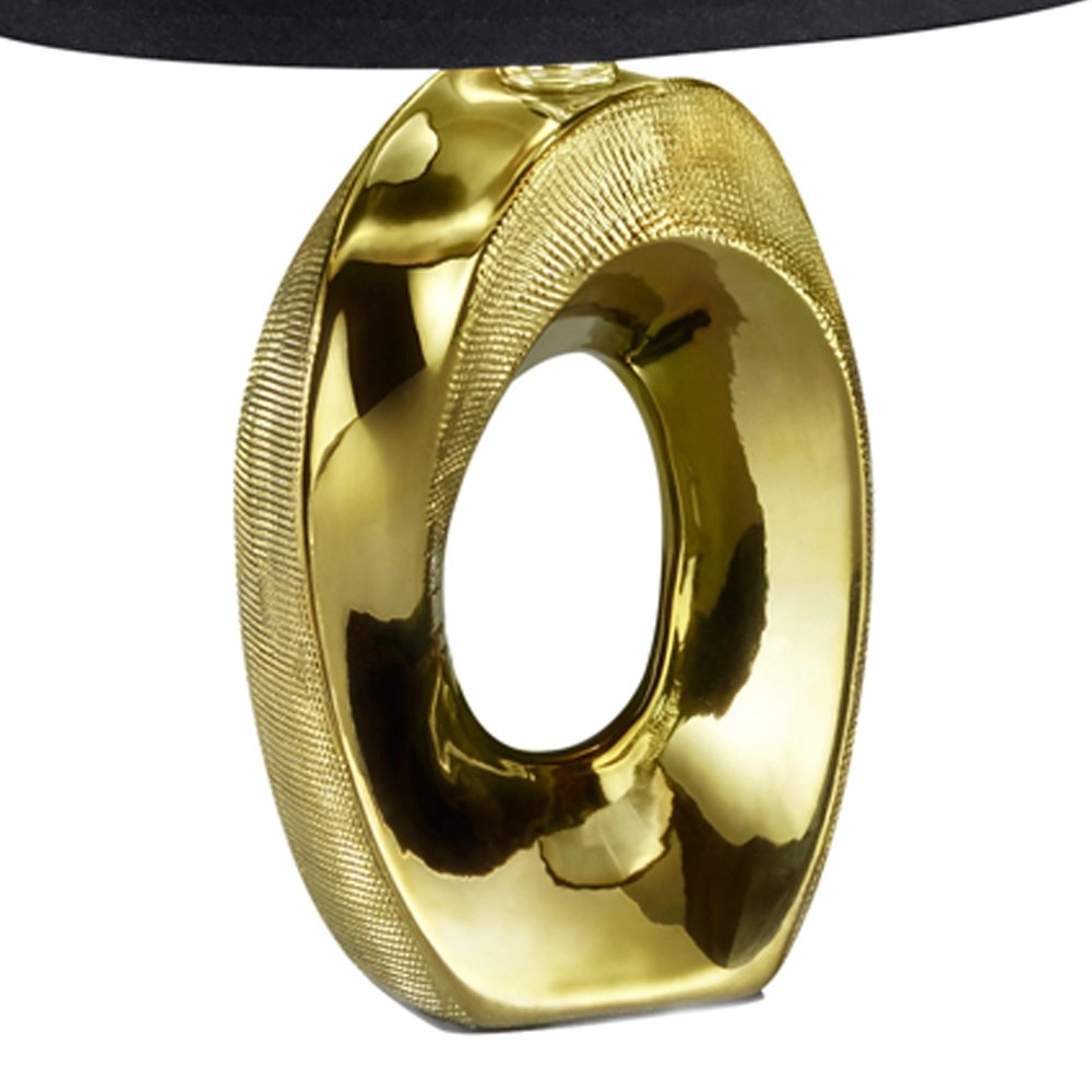 Design tafellamp Taba goud met zwarte lampenkap Trio 4017807377484